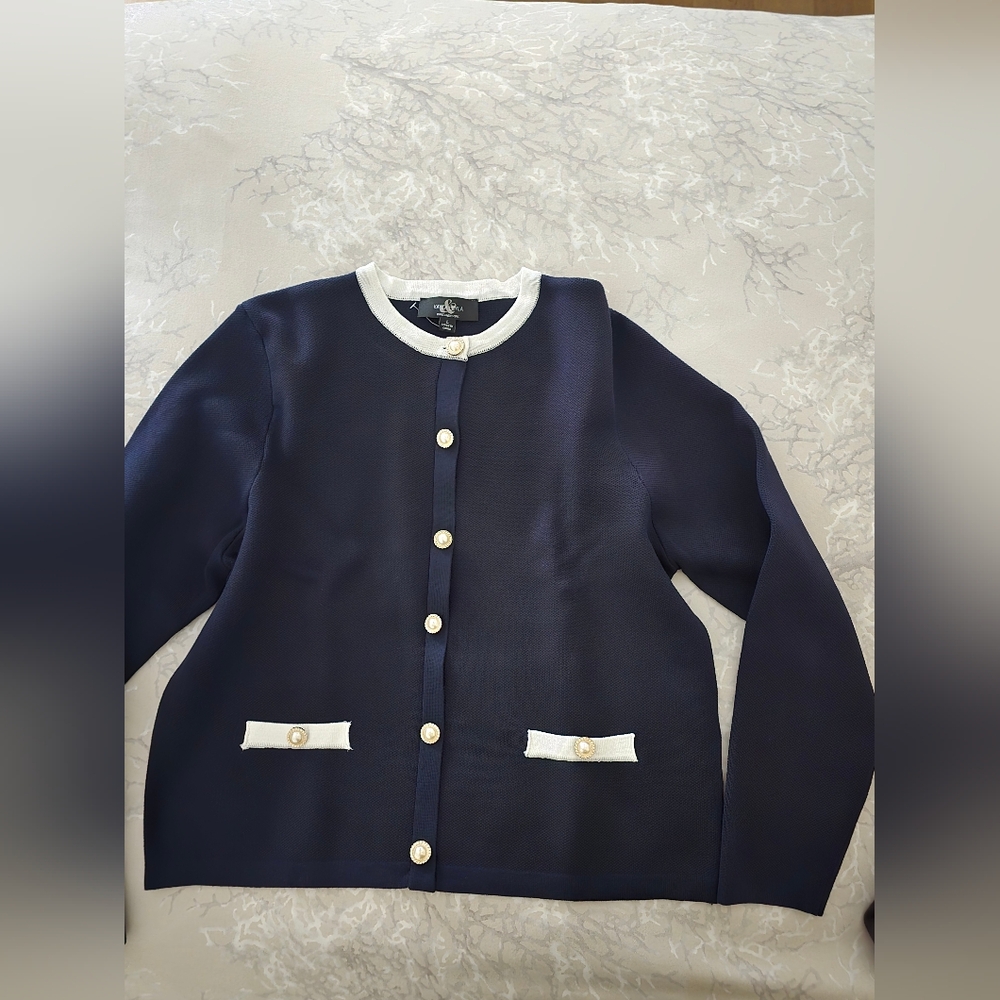 Classic Navy Knit Jacket with White Trim and Pearl Buttons